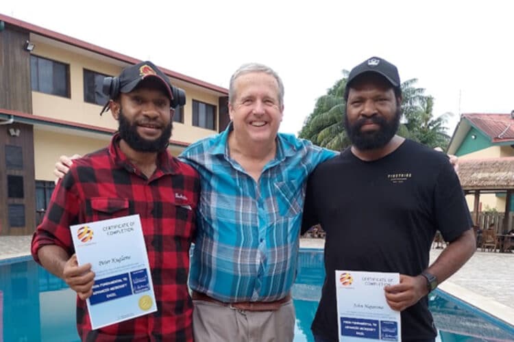 Dr Stephen Raywar with workers who have completed their certification. Image: DEKA Dynamics